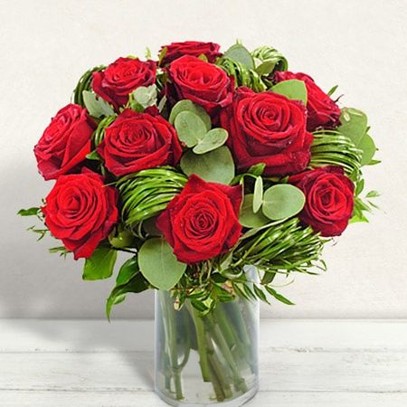 Bouquet rond avec 7 roses rouges (gros bouton) St Valentin